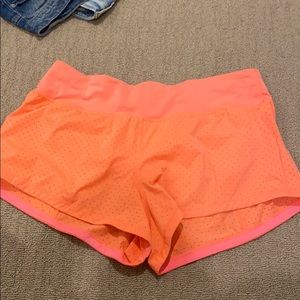Lululemon orange mesh shorts
